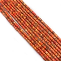 Macro detail of cylindrical imperial jasper stone beads with natural orange textures - Orange Red Mottled (No.15)