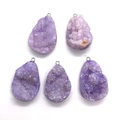 Detailed view of five purple teardrop druzy stone pendants with silver metal loops - 22x34mm / Purple