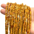 Macro view of square imperial jasper beads in earthy yellow tones for DIY jewelry making - 3x3x3mm Square Beads / Ginger Yellow Textured (No.8)