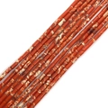 Macro shot of red jasper cylindrical tube beads for DIY jewelry with natural texture - 2x4mm / Orange Red (No.3)