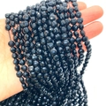 Gefacetteerde zwarte natuursteen kralen voor DIY sieraden, getoond in de handpalm - 6mm / Zwarte agaat
