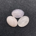 Set van drie ovale gepolijste rozenkwarts edelstenen met natuurlijke texturen - 6X8mm / Rozenkwarts