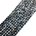 Makroansicht natürlicher schwarzer Jaspisperlen in Ovalform für DIY-Schmuck - 7X9mm / Grau-Weiße Textur