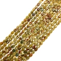 Detailed macro view of oval emperor stone beads with polished texture for jewelry DIY - 7X9mm / Dragon Blood Stone Pattern (No.8)