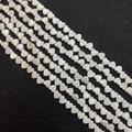 Close-up of heart-shaped white mother of pearl loose beads for DIY jewelry making - Horizontal Hole Heart Style / 6mm