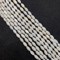 Rice-shaped white natural freshwater shell beads with mother of pearl luster for DIY jewelry - Rice Bead Style / 5x10mm