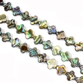 Natuurlijke abalone schelp klavervormige kralen met iriserende groene tinten - 12mm / Bladeren