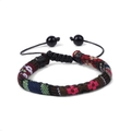 Close-up of woven bohemian bracelet with colorful patterns and adjustable black drawstring - Ethnic Geometric Pattern Style (FK0244)
