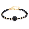 Verstelbare 4mm gefacetteerde zwarte steen armband met gouden accenten en lavasteen - Lavasteen