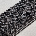 Cuentas redondas de obsidiana plateada de varios tamaños sobre fondo lino beige - 4mm / Obsidiana Plateada
