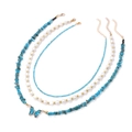 Detailed view of layered necklace with blue butterfly pendant and pearl beads - Dark Blue (FN1544)
