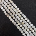 Macro shot of natural white shell loose beads with iridescent luster for DIY jewelry making - Disc / 6mm / Pearl White