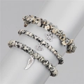 Dalmatian Jasper stretch bracelet set with star moon and feather charms on a display stand - Dalmatian Jasper (FK1311-19CM)