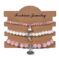 Detail view of pink stone bead bracelets with silver lotus and leaf charms on card - Pink and White Beaded Bracelet (FK1027-19CM)