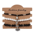 Ensemble de trois bracelets en perles avec pendentifs feuille et cloche sur carte - Bracelet Perlé Noir et Blanc (FK1030-19CM)