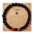 Bracciale zodiaco Leone con perle nere lucide e occhio di tigre su cartoncino regalo - Leone / 19cm