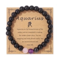 Bracciale Aquarius con perline nere e accenti rosa su cartoncino espositivo - Acquario / 19cm