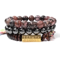 Lot de trois bracelets superposés avec pierres naturelles roses, perles et breloques dorées - Style Zen Rhodonite et Bois (FK1603)