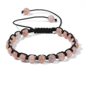 Bracciale regolabile in pietre naturali rosa 6mm con cordino nero intrecciato - 19cm / Pietra del sole