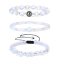 Set van 3 lichtblauwe kralenarmbanden met onregelmatige stenen en zwart vlechtkoord - 3-delige set / Opaalwit