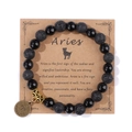 Primer plano de la pulsera del zodiaco Aries con cuentas de lava y amuleto de bronce - 19cm / Aries (H0256) / Negro