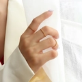 Minimalist stackable 18k gold plated stainless steel thin rings worn by a model - US 5 / Gold