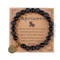 Pulsera de Capricornio con piedra de lava negra y moneda de zodiaco bronce en tarjeta - 19cm / Capricornio (H0246) / Negro