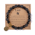 Pulsera de cuentas Leo de piedra volcánica negra con colgante dorado en tarjeta - 19cm / Leo (H0250) / Negro