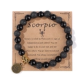 Pulsera del signo Escorpio con piedras volcánicas negras en tarjeta de cartón - 19cm / Escorpio (H0255) / Negro