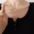 Ancient Egyptian totem necklace with gold plated sun pendant and cubic zirconia stone - 40+5cm / Gold