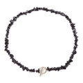 Handmade necklace with black irregular stones and a textured golden OT clasp toggle - 19cm