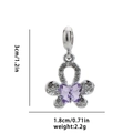 Macro detail of silver butterfly charm with purple crystal and zirconia pave setting - Purple Butterfly
