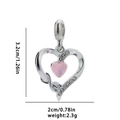 Macro view of silver heart pendant with pink gem and clear size labels 3.2cm by 2cm - Pink Heart
