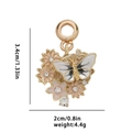 Detail of butterfly and flower pendant with enamel coating and white crystals - Butterfly Flower Combo