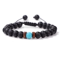 Dettaglio del bracciale a corda intrecciata con perle nere opache e pietra turchese blu - Turchese Blu (Perline Opache)