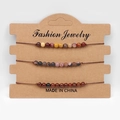 Ensemble de trois bracelets tressés avec pierres naturelles 4mm sur carte kraft - Style de Combinaison Agate Rouge et Quartz Rose Œil de Tigre (FD9946)