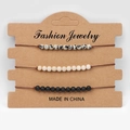 Lot de trois bracelets tressés avec perles de jaspe et pierres de lave noires - Style Tacheté Noir Blanc et Pierre de Lave (FD9947)