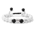 Detail of beaded friendship bracelet with silver heart pendant and adjustable black rope - Single White Woven Bracelet