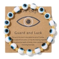 Blue and white Evil Eye beaded bracelet on a kraft card for good luck and protection - White Blue