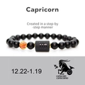 Dettaglio del bracciale Capricorno con agata nera opaca e perla in vetro giallo - Capricorno