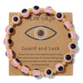 Pink and black evil eye bead bracelet on kraft card with 18k gold accents - Pink Black