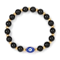 Dettaglio macro del bracciale elastico malocchio con agata nera e distanziatori oro - 19cm / Vetro Nero Lucido (FD10760)