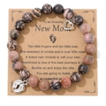 Blue-purple imperial stone beaded bracelet with heart and baby foot charms for new moms - Rhodonite