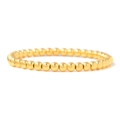 Vue détaillée de perles rondes en métal doré poli sur un bracelet extensible minimaliste - Bracelet à Perles Dorées (1)