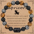 Bracciale Capricorno da uomo con perle di 8mm in occhio di tigre e agata nera - Capricorno