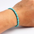 Natural turquoise bead bracelet with oval stones worn on wrist for men and women - Sky Blue Oval Style (10)