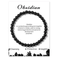 Detail of 6mm black obsidian bead bracelet on white card with artistic mineral graphics - Black Glass (CC1401)
