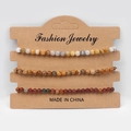 Three-piece set of natural stone bead bracelets in mixed earth tones on display card - Bamboo Leaf Agate Picture Jasper Red Stone A+
