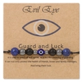 Dettaglio del bracciale Evil Eye intrecciato con occhio di tigre su cartolina - Stile Texture Lapislazzuli (CCA304)