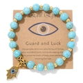 Détail du bracelet main de Fatma et œil maléfique sur carte avec perles turquoise - Style Turquoise Bleue (CCA165)
